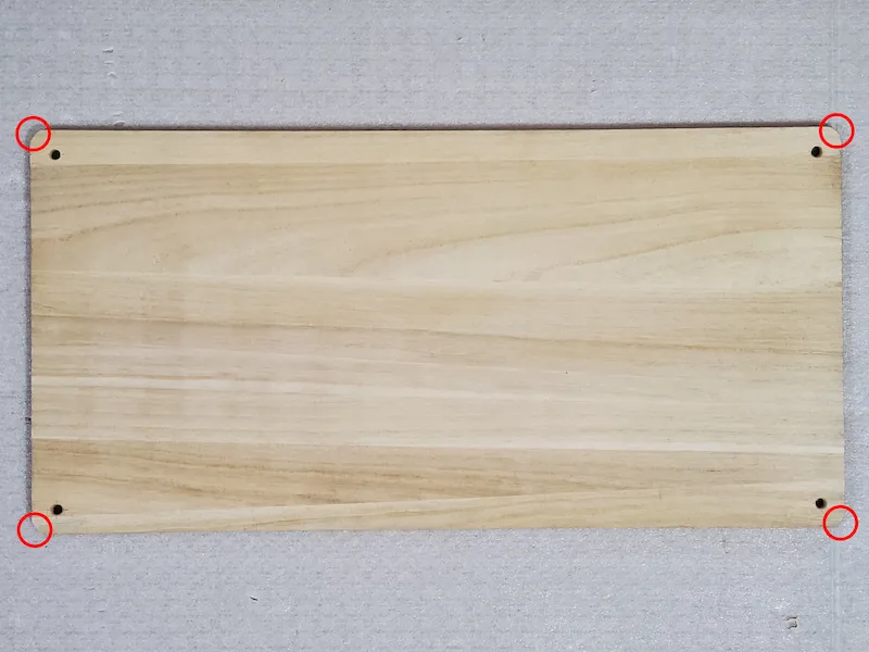 四つ角を切り落とし丸くした板材